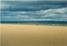 Mentone Beach , Melbourne, with Mordialloc Pier in the middle distance in front of the Frankston seen in the distance.